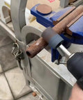 Pro Grade 20mm Cylindrical Grinding Stone Set With 1 Quarter Inch Shank Aluminum Oxide Mounted Grinding Stones in use on metal pipe