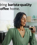 Woman enjoying espresso near Fully Automatic Coffee And Espresso Machine For Home Use With 35 Drink Menu Double Cup Barista Style Pro Level