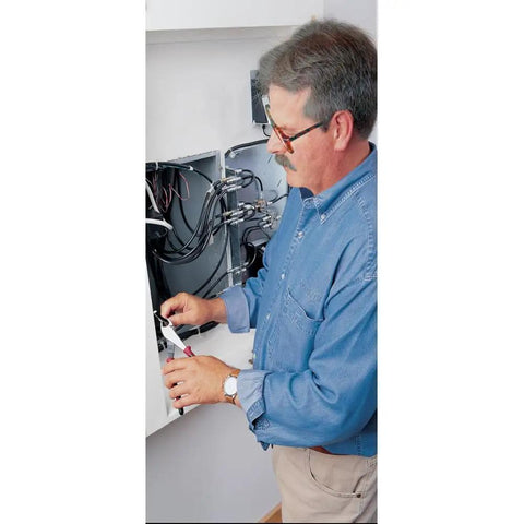 Man using Diagonal Cutting Pliers With Angled Head For Tight Spaces 8 Inch High Leverage With Short Jaws Built For Heavy Duty Go To Electrician Work 36 Percent More Cutting Power Made In USA Durable Electrical Tool on wires in an electrical box.
