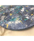 Close-up of 16 inch floral resin Lazy Susan in blue gold white on wood serving tray base.