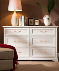 White dresser in a farmhouse-style room featuring Antique Rose Gold Zinc Alloy Cabinet Pulls Set Of 10 For Farmhouse Kitchens And Vintage Dressers.