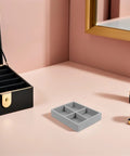 Velvet Jewelry Organizer Tray With Four Grid Compartments Stackable Minimalist Ring And Bracelet Tabletop on dresser.
