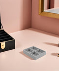 Premium Solid Go-To Velvet Jewelry Tray, Four Secure Grid Dividers on a stylish vanity table.