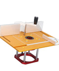 Premium Rock Solid Aluminum Router Lift Kit For Woodworking Tables Featuring Smooth 54 Mm Micro Adjustment and Complete Fence Insert Plate Hardware Setup, top view of router lift with orange base.