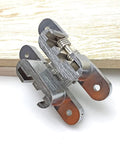 Stainless Steel Hidden Hinge Set for 180 Degree Folding Doors and Cabinets 2 Pack Concealed Cross Door Hinges, shown on wooden surface