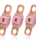 Three Piece Midi Fuse Assortment Featuring 125 Amp High Current Copper Plated Bolt On Battery Fuses For Cars Trucks And Heavy Gear With Hella Tough Road Ready Protection. Close up of three 125A fuses with copper terminals.