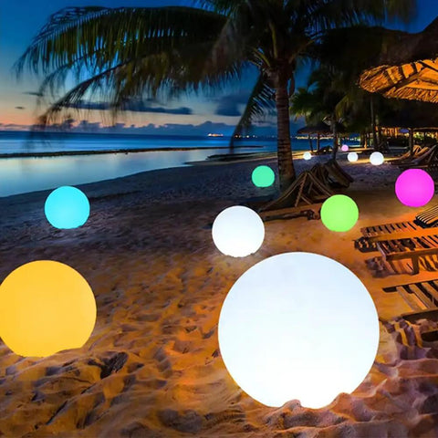 Beach scene illuminated by Cordless 16 Inch LED Glowing Ball Light With Remote RGB Color Changing Waterproof Glow Ball.