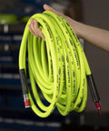 Heavy Duty Lightweight Hybrid Air Hose 3/8 Inch By 25 Feet With ColorConnex Type D Coupler And Plug displayed coiled