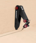 Straight Shooting Scribing And Compass Tool With Flex Head, used to mark precise lines on plywood surface.