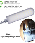 Close-up of 2 Pack LED Sewing Machine Light with Flexible Gooseneck Arm and Magnetic Base 30LEDs 6W next to sewing machine.