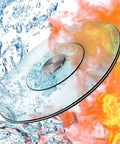Go-To Heavy-Duty Glass Lazy Susan Turntable with explosion-proof double glass and anti-skid base shown in dynamic liquid and fire background.