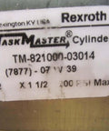 Label on Rexroth Bosch TM82100003014 Hydraulic Cylinder showing model and specs, including TM-821000-03014 and max pressure 39200 PSI.