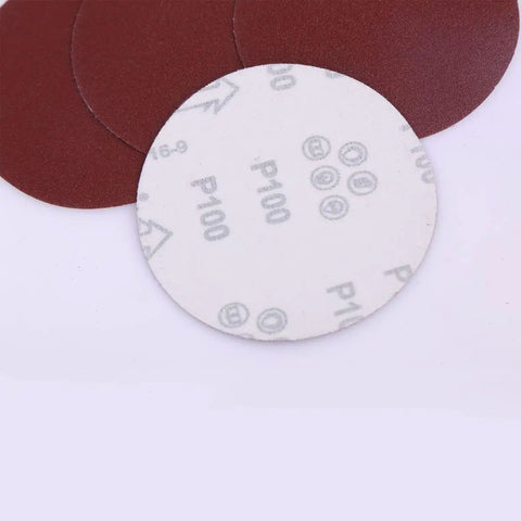 Get This Awesome 100 Piece 7 Inch Hook And Loop Sandpaper Disc Set With Grits From 60 To 1000 For Wet Or Dry Sanding Projects And Polishing That Gets The Job Done Smooth And Quick Every Single Time: close-up of various grit sandpaper discs.