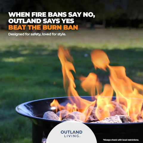 Portable Propane Fire Pit 19 Inch Smokeless Gas Firebowl With Carry Kit And Cover, 58,000 BTU, in use on a lawn