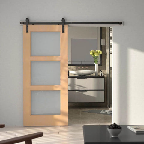 Orb Oil Rubbed Bronze Sliding Barn Door Hardware Kit with 6.6 Foot Track installed on a wooden door in a modern interior