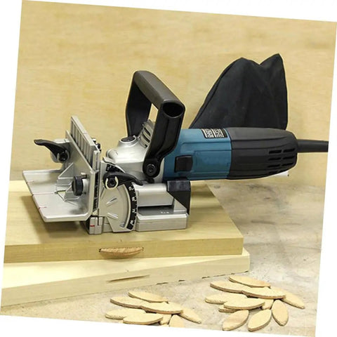 100 Pcs Wood Biscuit Tenon Joiner Tool For Strong Framing And Furniture Joints, Ideal For Thin Materials Under 15mm And Long Narrow Applications, Durable Hardwood Connectors For Crafting, Lumber, Plywood, And More. Image shows joiner tool with biscuits and wood pieces.