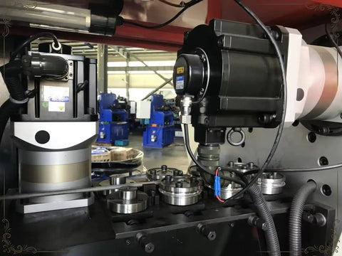 Rock Solid Six Axis Cnc Wire Spring Machine With Slick Automatic Coiling For Legit Compression Extension And Torsion Spring Fabrication On Your Daily Shop Floor close-up of motor and coiling mechanisms.