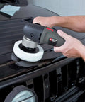 Person using Car Buffer Polisher For Detailing, 6 Inch Orbital Polisher With Variable Speed 2,500 To 6,800 OPM on black car hood