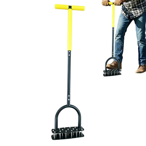 Manual Lawn Aerator Tool With T Handle And Stainless Steel Spikes For Deep Soil Loosening In Garden Lawn Flower Beds And Patios, Improves Drainage And Reduces Soil Compaction In High Traffic Areas 99x24cm displayed with user handling in garden.