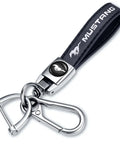 Top Shelf Genuine Leather Car Keychain With Mirror Polish Zinc Alloy Hook Fresh Daily Grind Accessory For Ford Mustang Owners Sleek Black Auto Key Ring Gift close-up of keychain with black leather strap and metal clip.