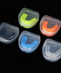 Multicolored sports mouth guards in cases, for youth and adults, ideal for football, basketball, boxing, MMA, and hockey protection.