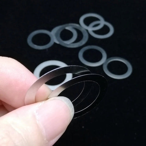 M3 To M20 304 Stainless Steel Ultra Thin Flat Washers Set 0.1 0.2 0.3mm Thick Assortment Kit Gasket Shim For Builders And DIY Pros Durable Rust Resistant For All Weather Use, hand holding thin washers