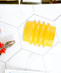 Tamper Bellows Boot Heavy Duty Rubber Dust Sleeve Replacement shown on white tile flooring with pliers nearby