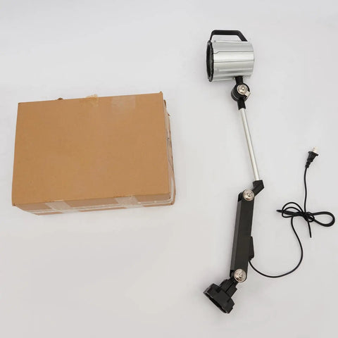 Heavy Duty Long Arm Machine Work Light, 18W LED With Multi-Joint Adjustable Design beside its packaging on a white background.