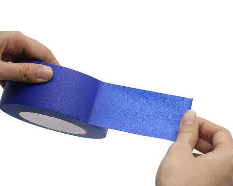 Blue Painters Tape Set With Four Sizes One Half Inch, Three Quarter Inch, One Inch And Two Inch, 60 Yards Each, in hand, easy tear