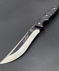 Full Tang Fixed Blade Knife With Two Tone Black And White Blade, Custom Laser Engraving, Nylon Sheath Included, angled view on black surface
