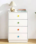 White dresser with multicolored knobs in room setting, showing Six Pack Ceramic Cabinet Knobs One And A Quarter Inch White.