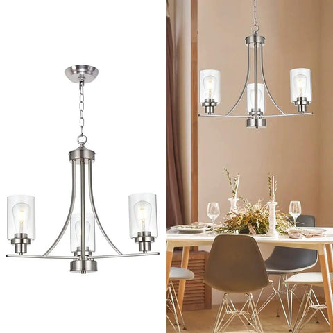 3 Light Brushed Nickel Pendant Chandelier With Clear Glass Shades over dining table in modern setting