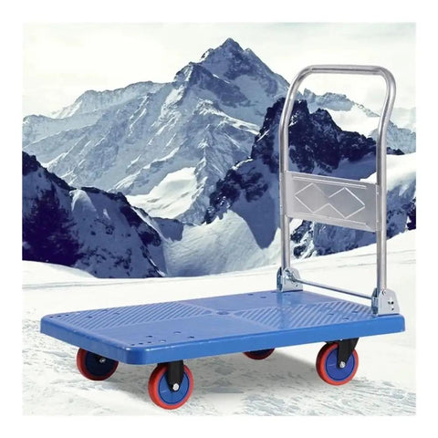 Heavy Duty Foldable Rolling Dolly, No Sweat Hauling With Silent Wheels, Space Saving Steel Frame Pushcart For Quick Home Moves And Warehouse Jobs, Solid Blue Build on snowy terrain.