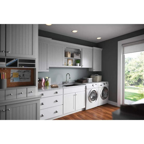 Laundry room with Laundry Utility Faucet With Flexible Spout And Forward Lever In Chrome Finish, dual washer and dryer setup.