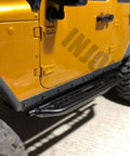 Close-up of RC Car Pedals and Rock Slider Side Boards 2 Pc Set for 1:10 Crawlers on Axial SCX10 chassis, metal construction.