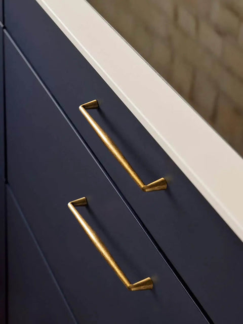 Straight Up Classic Antique Brass Pulls for kitchen drawers, solid zinc alloy, 7.56 inch hole centers, navy cabinets.