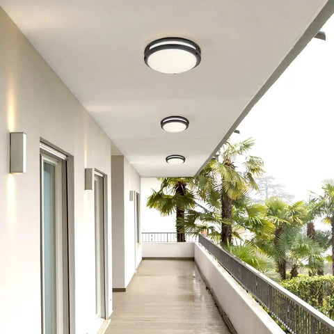 14 Inch LED Flush Mount Ceiling Light Fixture With 5 CCT Selectable 2700K To 5000K, Dimmable Indoor Round Kitchen Ceiling Light, 1900 Lumens, 90 Watt Equivalent, Black Finish, Easy Install on a covered patio ceiling.