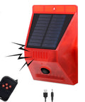 Red Solar Outdoor Motion Alarm with 129dB siren, 4 mode strobe light, remote control, USB cable, easy setup for home security.