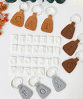 Dope 26 Piece Alphabet Polymer Clay Cutters Set Uppercase Letters with keychains, polymer clay molds, durable plastic, clean edges.