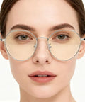 30 Pcs Anti Slip Silicone Nose Pads For Glasses With Hexagon Grip Stops Slide Dead In Its Tracks Keeps Specs Snug On Oily Skin Includes Screwdriver And Cloth For Quick Fixes worn by a woman with round glasses