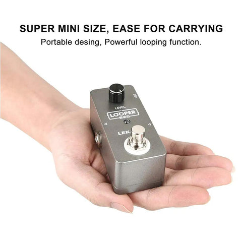 Hand holding Guitar Looper Pedal With 5 Minute Loop Time Ultra Compact Aluminum Build Dope 24-Bit Uncompressed Audio One Looper