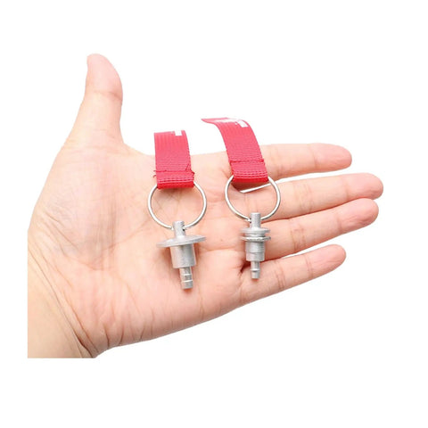Hand holding RC Aircraft Fuel Tank Vent and Oil Outlet Nozzle Kit Aluminum Alloy Flange Nozzles with red sealing rings.