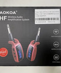 Box of XIAOKOA UHF Wireless Audio Amplification System with two red transmitter units and LED screen display.