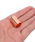 Premium Copper Coupling Fittings 0.59 Inch Straight Pipe Connectors shown in hand, ideal for HVAC and plumbing applications.