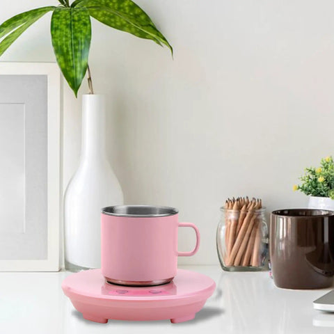 Electric Desk Cup Warmer And Cooler For Coffee Mugs Cans Bottles Precise Hot Cold Temp Control on a desk with a pink cup.
