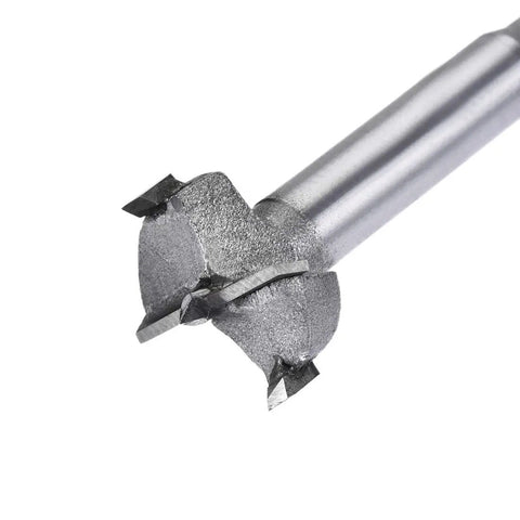 Tough As Nails Forstner Drill Bit Set 21 mm carbide tipped bit close-up view showing sharp edges and round shank design.
