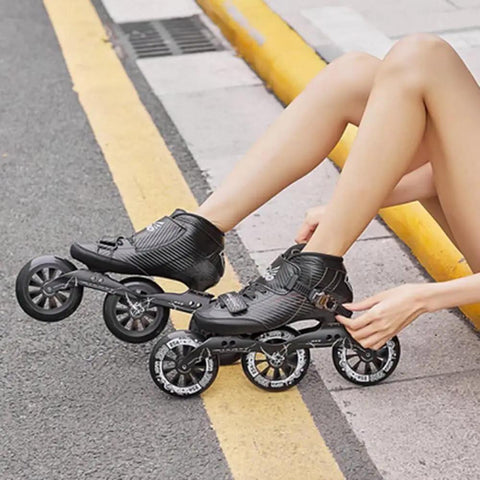 Person wearing Carbon Fiber Inline Speed Skates with 3x110mm Blue PU Wheels, ABEC-9 Bearings on outdoor street