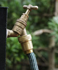 Expandable Hose Repair Kit With Brass GHT Fittings And Ball Valve 0.353 Inch Barb connected to outdoor tap