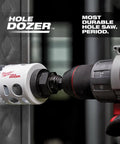 Hole Dozer bi-metal hole saw, 3 in diameter, Milwaukee brand, mounted on drill