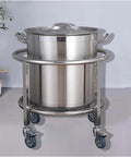 Heavy Duty Steel Drum Dolly Cart For Moving Industrial Barrels Kitchen Soup Pots And Milk Buckets Adjustable Height Roller Rack with a stainless steel pot on a wheeled cart.